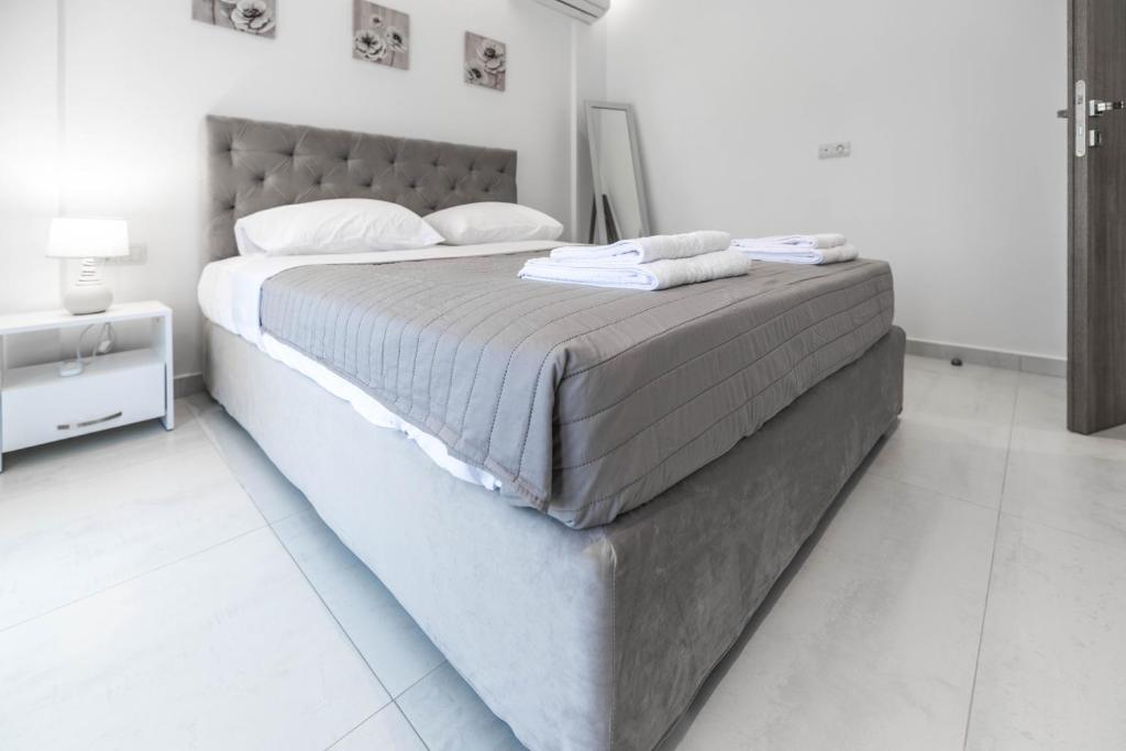 Postel nebo postele na pokoji v ubytování Demiani House