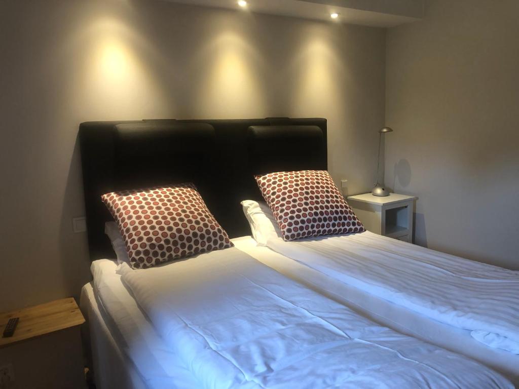 Postel nebo postele na pokoji v ubytování Skulesjön Hotell