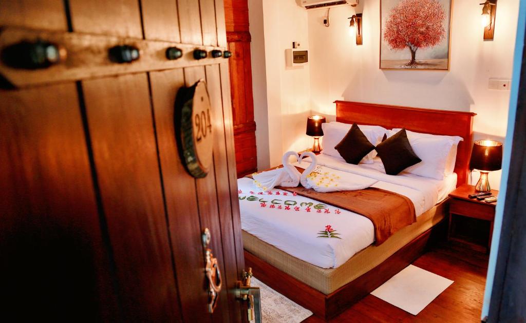 Postel nebo postele na pokoji v ubytování Tepraas Sigiriya