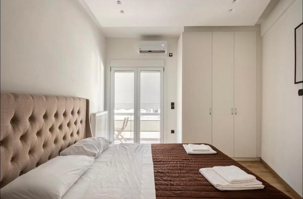 Posteľ alebo postele v izbe v ubytovaní Nazar Apartment- in the center of Athens