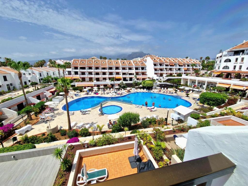 an aerial view of a resort with a swimming pool at Parque Santiago 1 F-348 by TENERIFE DREAM PROPERTIES in Playa de las Americas