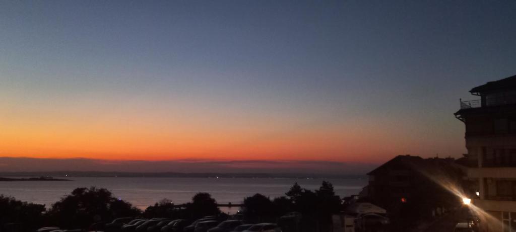 a view of the sunset from a building at Casa Branca in Sozopol