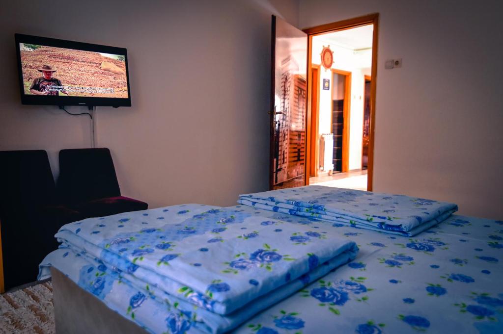 Postel nebo postele na pokoji v ubytování Marko Polo Apartment