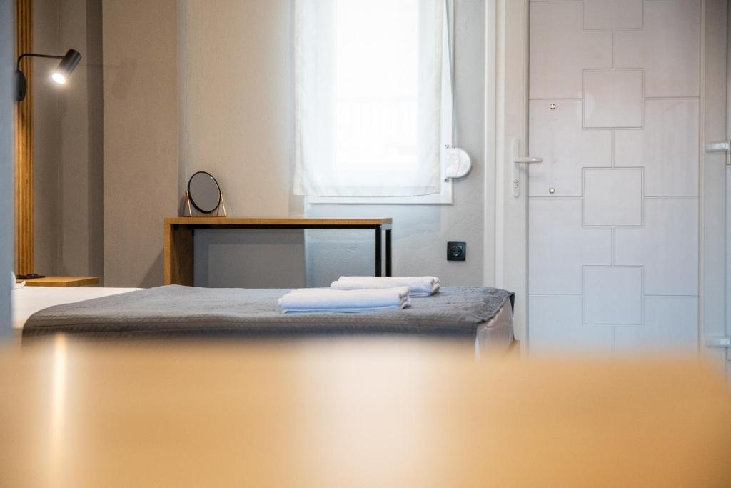 Łóżko lub łóżka w pokoju w obiekcie Unique Aura Luxury Studios