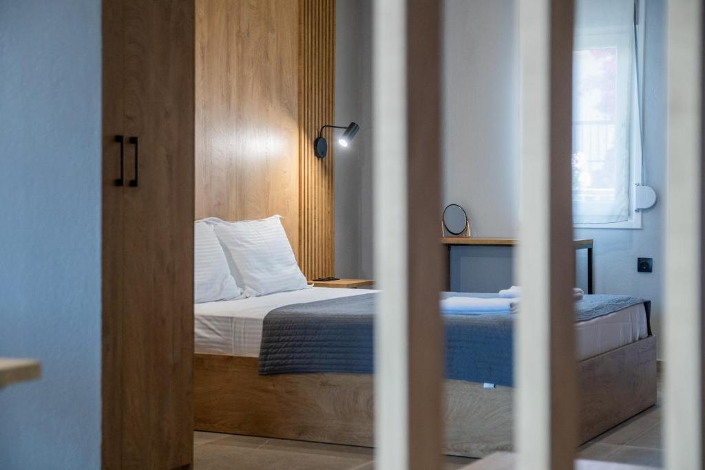 Łóżko lub łóżka w pokoju w obiekcie Unique Aura Luxury Studios
