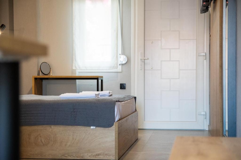 Łóżko lub łóżka w pokoju w obiekcie Unique Aura Luxury Studios