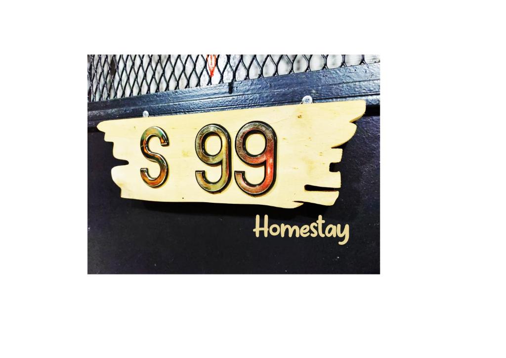 a close up of a house number on a wallet at S99 HOMESTAY KUDAT in Kudat