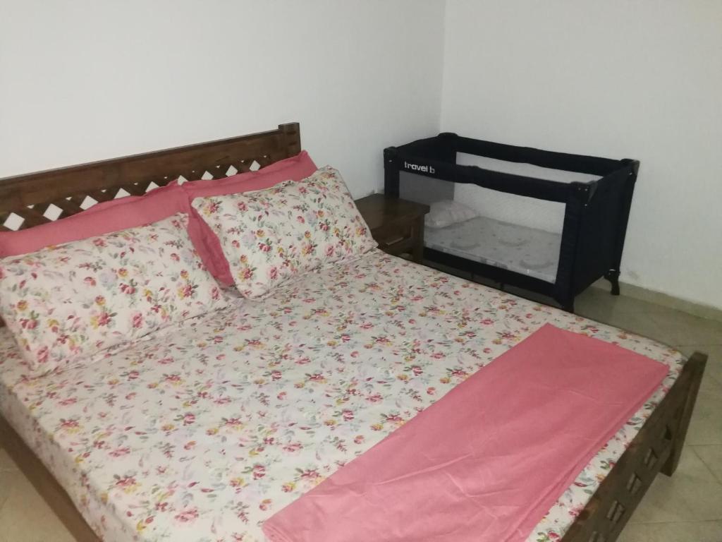 Postel nebo postele na pokoji v ubytování Grand Appartement Martil