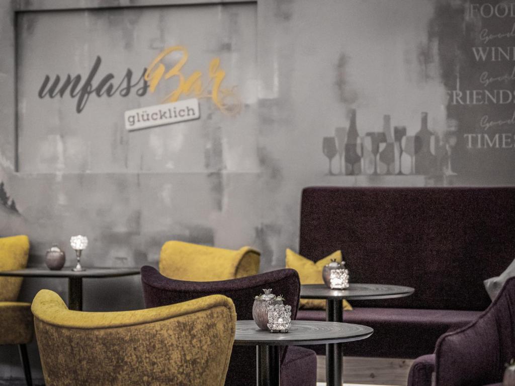 Posezení v ubytování Hotel Alpenland