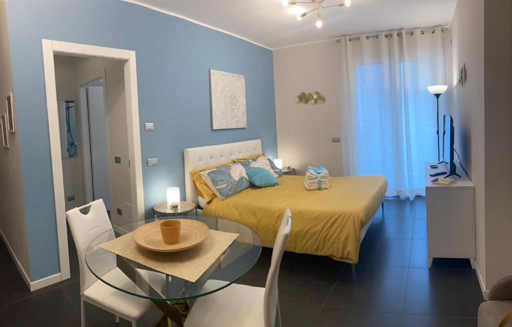 Postel nebo postele na pokoji v ubytování Bloom Apartment