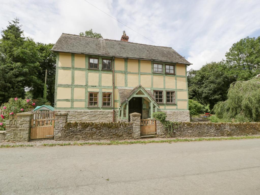 an old house on the side of the road at The Old Rectory in Presteigne