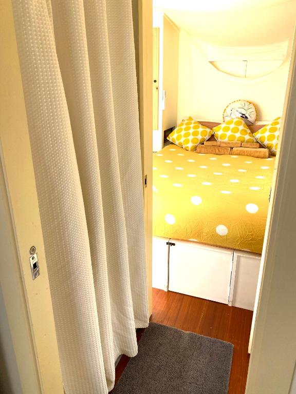 Postel nebo postele na pokoji v ubytování Tiny House Spectacular Eco Retreat & Cosy