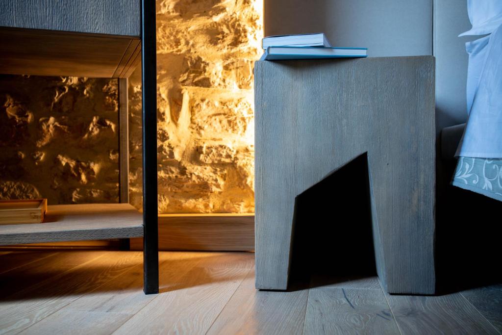 Postel nebo postele na pokoji v ubytování Forma Your Boutique Suite