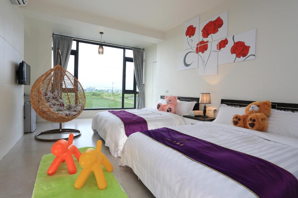 Postel nebo postele na pokoji v ubytování Flower B & B