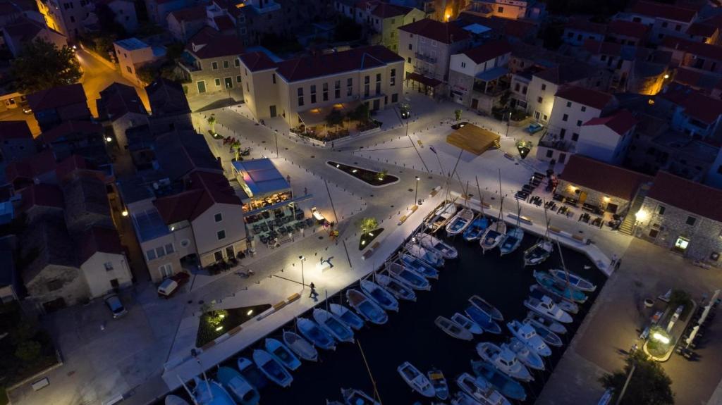 an aerial view of a marina at night at Apartman Marija in Betina