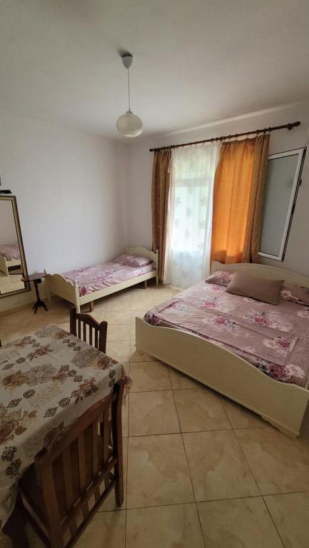 Postel nebo postele na pokoji v ubytování Harmony