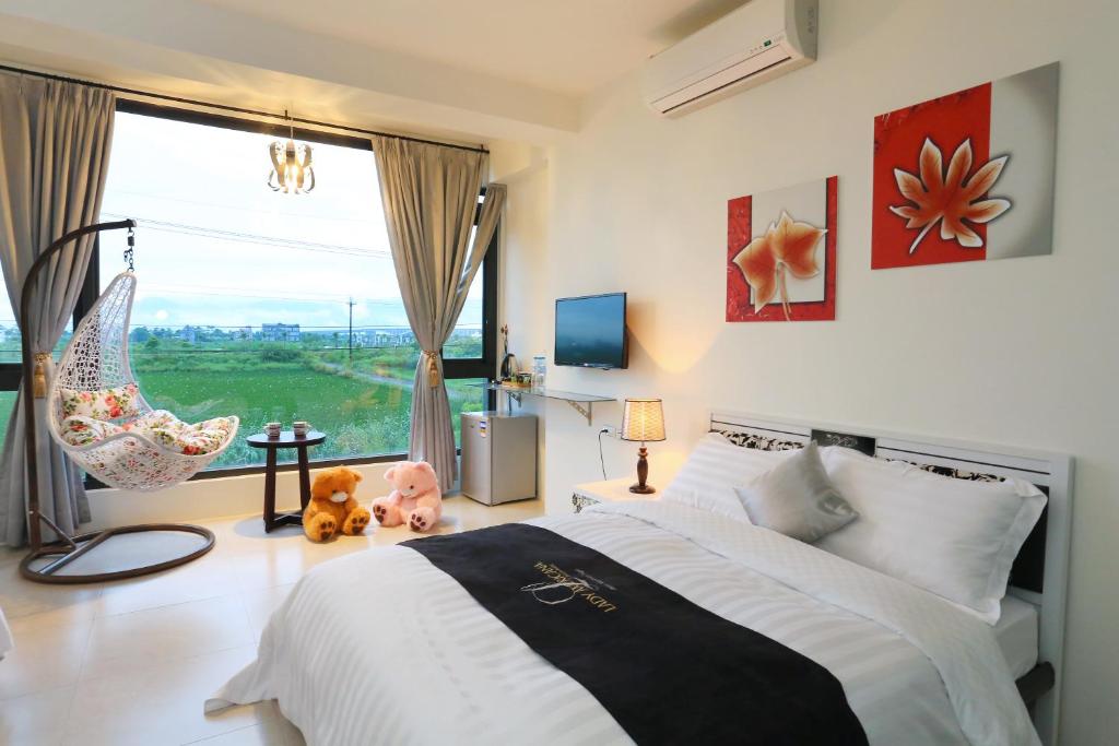 Postel nebo postele na pokoji v ubytování Flower B & B