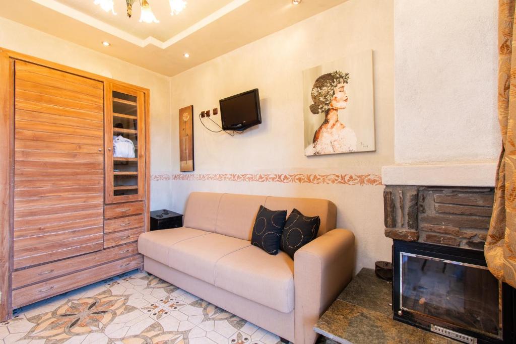 TV a/nebo společenská místnost v ubytování Oreiades Guesthouse