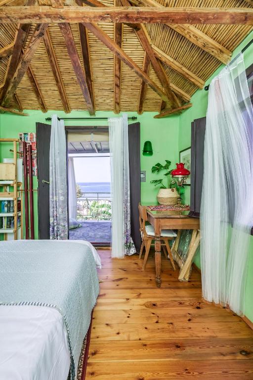 Postel nebo postele na pokoji v ubytování Malsova Maisonette