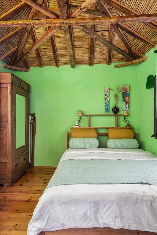 Postel nebo postele na pokoji v ubytování Malsova Maisonette