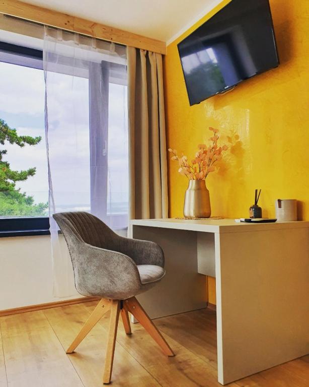 TV a/nebo společenská místnost v ubytování Sousedi Pavlov