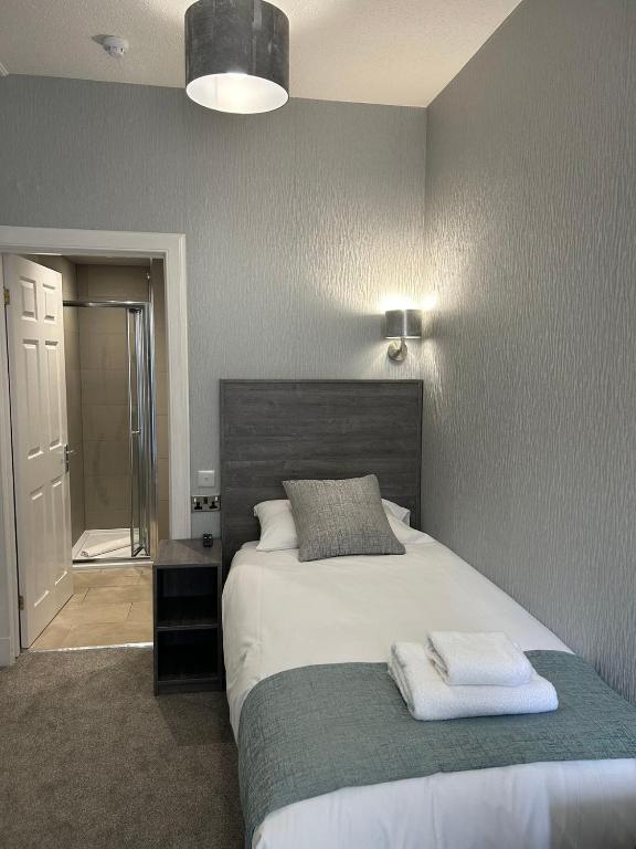 Letto o letti in una camera di Arrandale Guest House