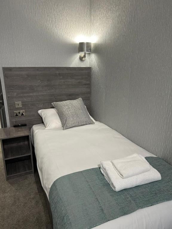 Letto o letti in una camera di Arrandale Guest House
