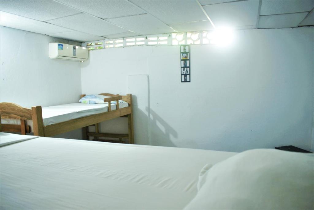 Postel nebo postele na pokoji v ubytování Hosting and Travel Services 420
