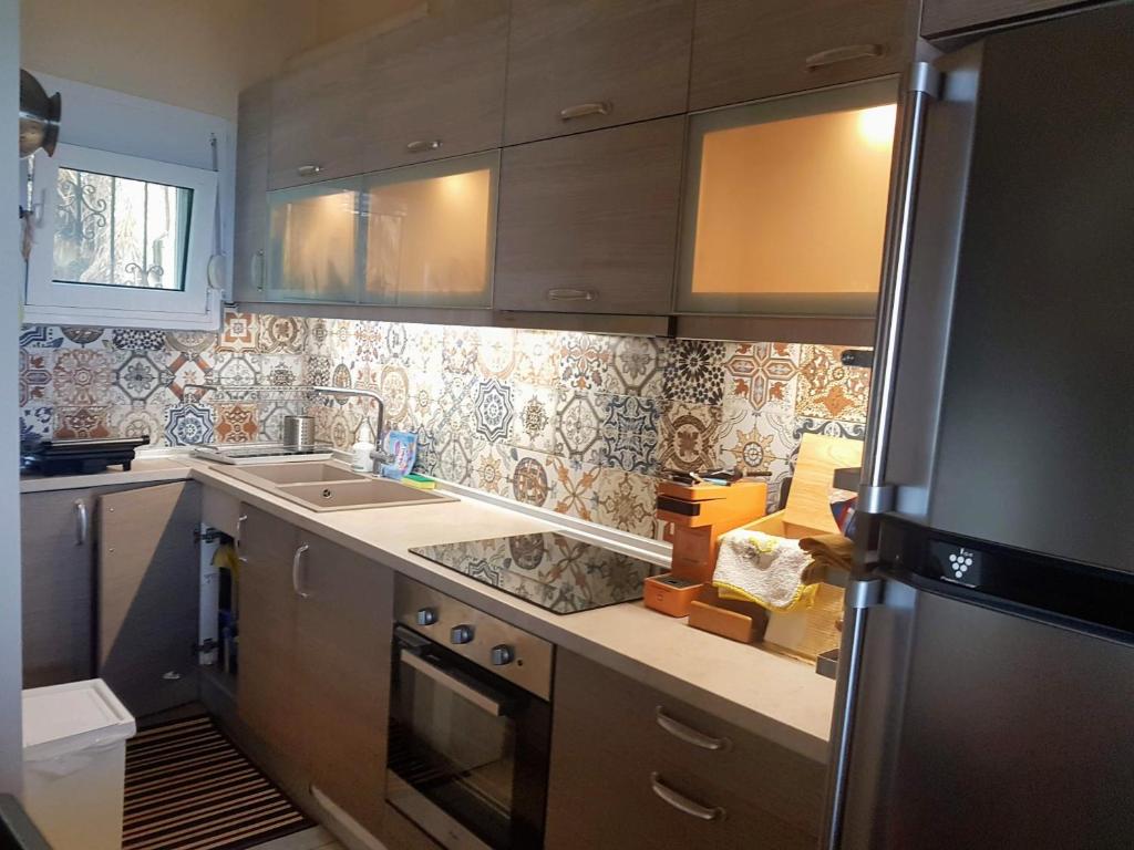 Kuchyň nebo kuchyňský kout v ubytování Modern seaside maisonette 130 m2 Oikia Litsas Paliouria Larissas