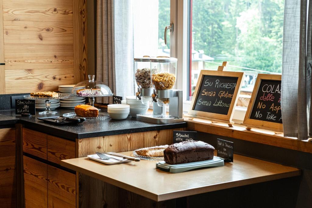 Kuchyň nebo kuchyňský kout v ubytování Hotel Bel Sit