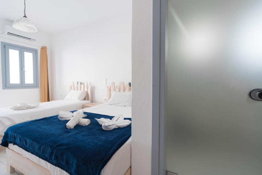 Postel nebo postele na pokoji v ubytování Dodomar Selection