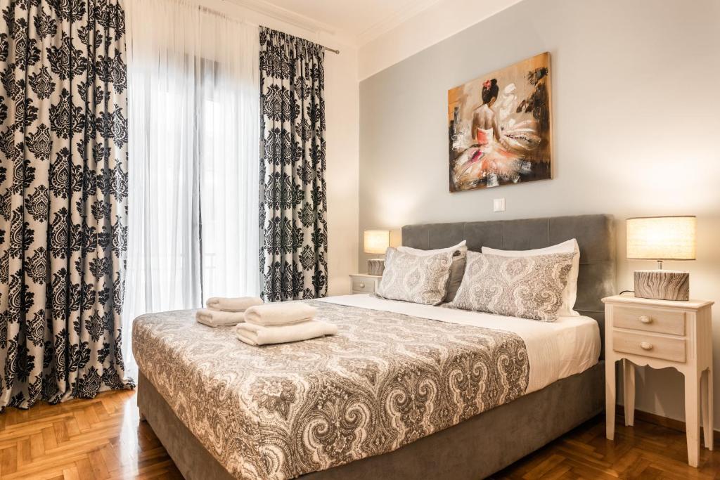 Posteľ alebo postele v izbe v ubytovaní Nicholas Point Apartments and Rooms