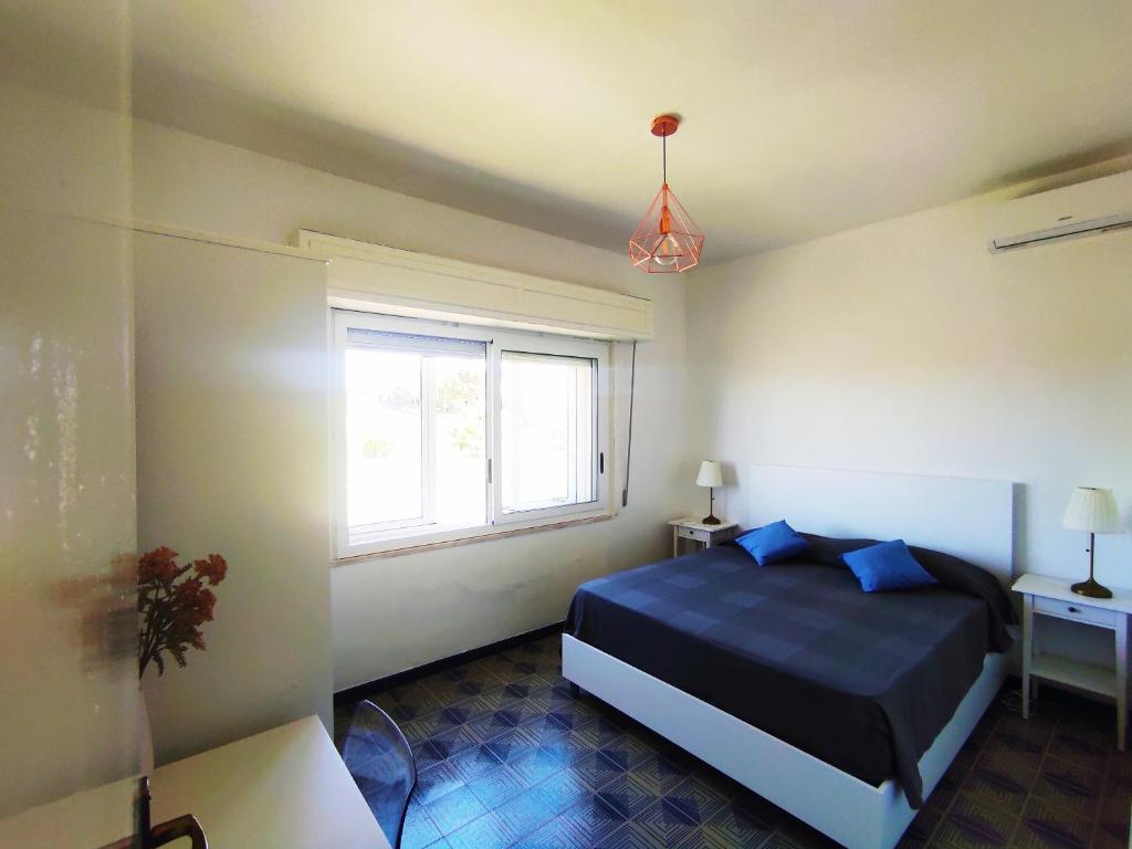Posteľ alebo postele v izbe v ubytovaní Villa Orizzonte sullo Jonio