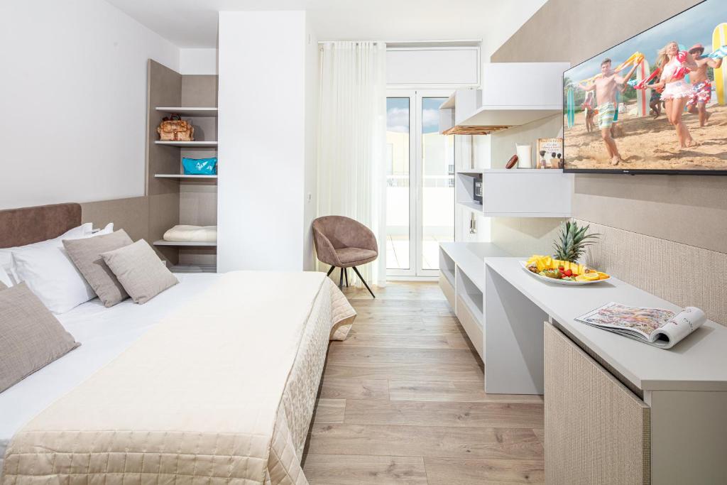 Postel nebo postele na pokoji v ubytování Hotel Condor