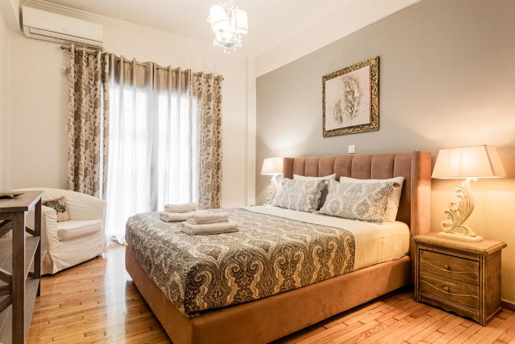 Posteľ alebo postele v izbe v ubytovaní Nicholas Point Apartments and Rooms