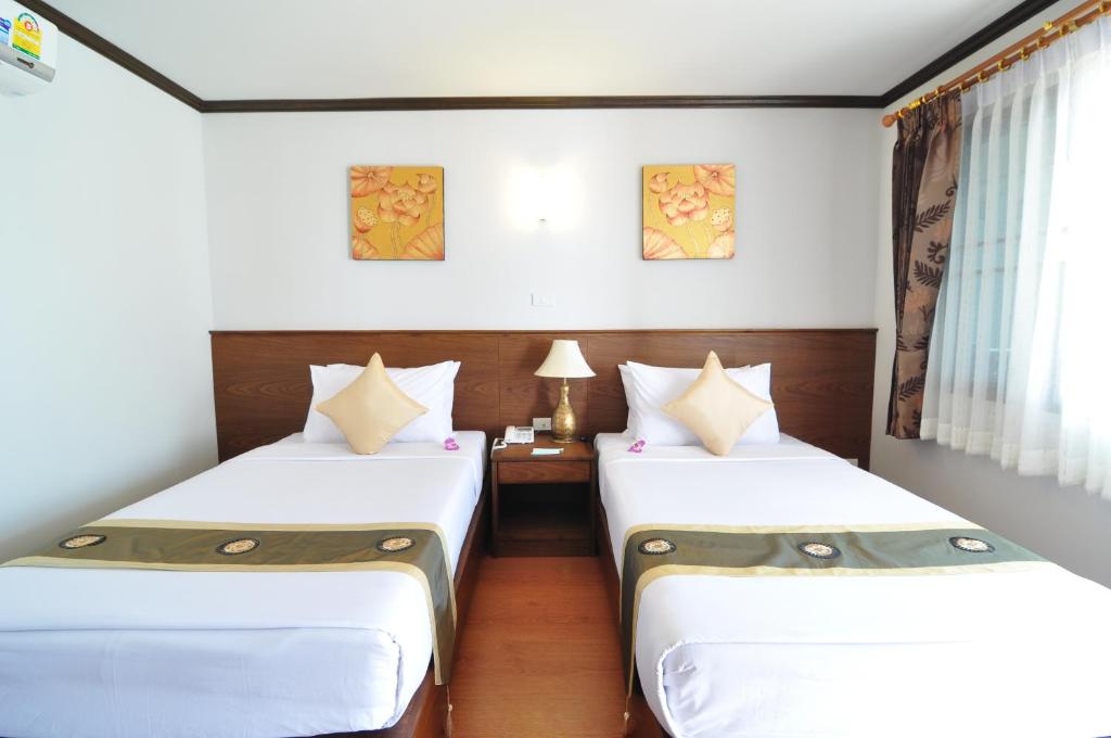 Postel nebo postele na pokoji v ubytování Top North Hotel