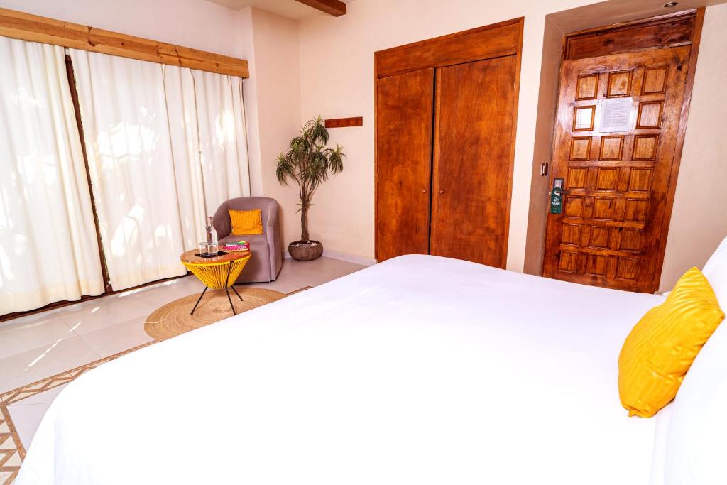 Cama ou camas em um quarto em Enigmatic Hotel Experience