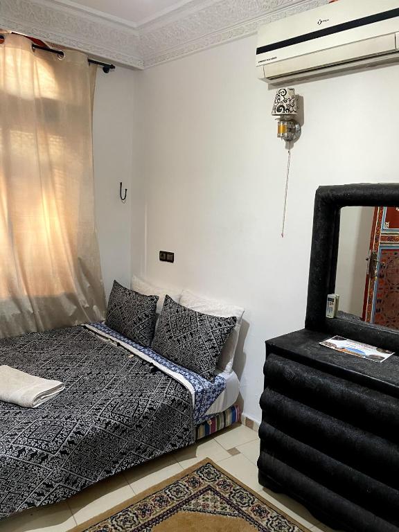 Postel nebo postele na pokoji v ubytování Riad Malak