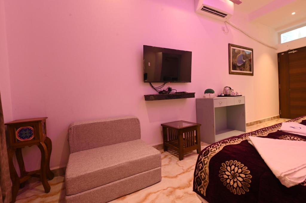 TV a/nebo společenská místnost v ubytování Hotel Quinta da Branca - near baga beach