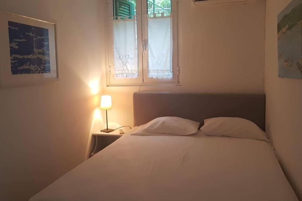 Postel nebo postele na pokoji v ubytování Mare Villa Ciel - by Portogaios Paxos Superior Living