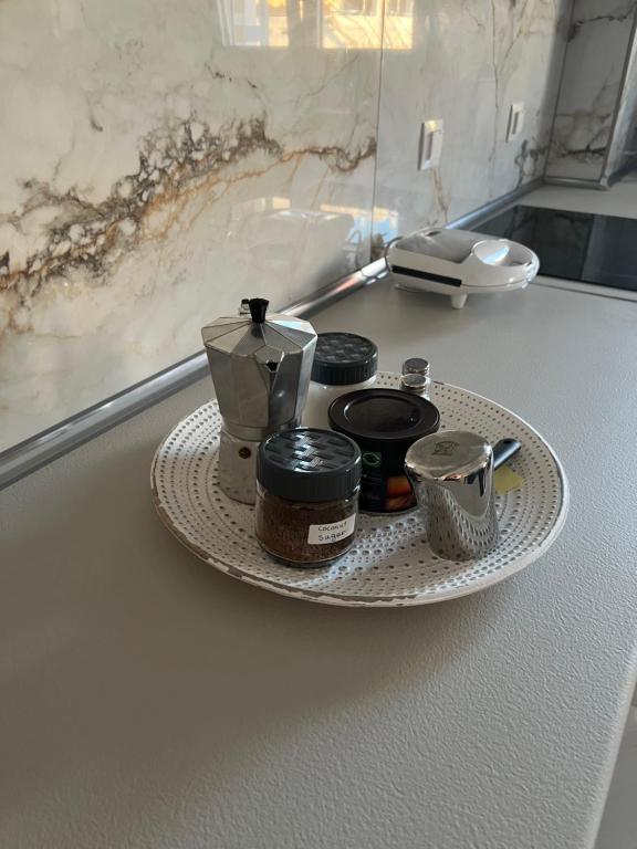 Příslušenství pro přípravu čaje a kávy v ubytování Sissi Olive home