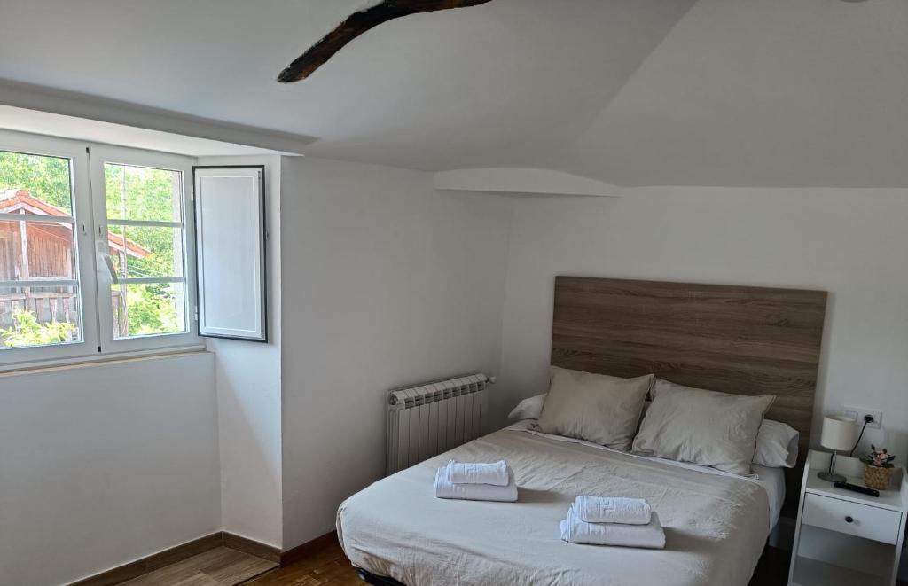 Postel nebo postele na pokoji v ubytování CASA A CALLE