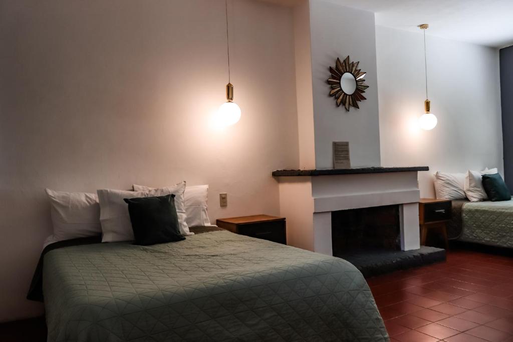Postel nebo postele na pokoji v ubytování Casa Sabina
