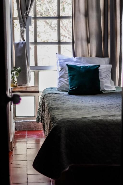 Postel nebo postele na pokoji v ubytování Casa Sabina