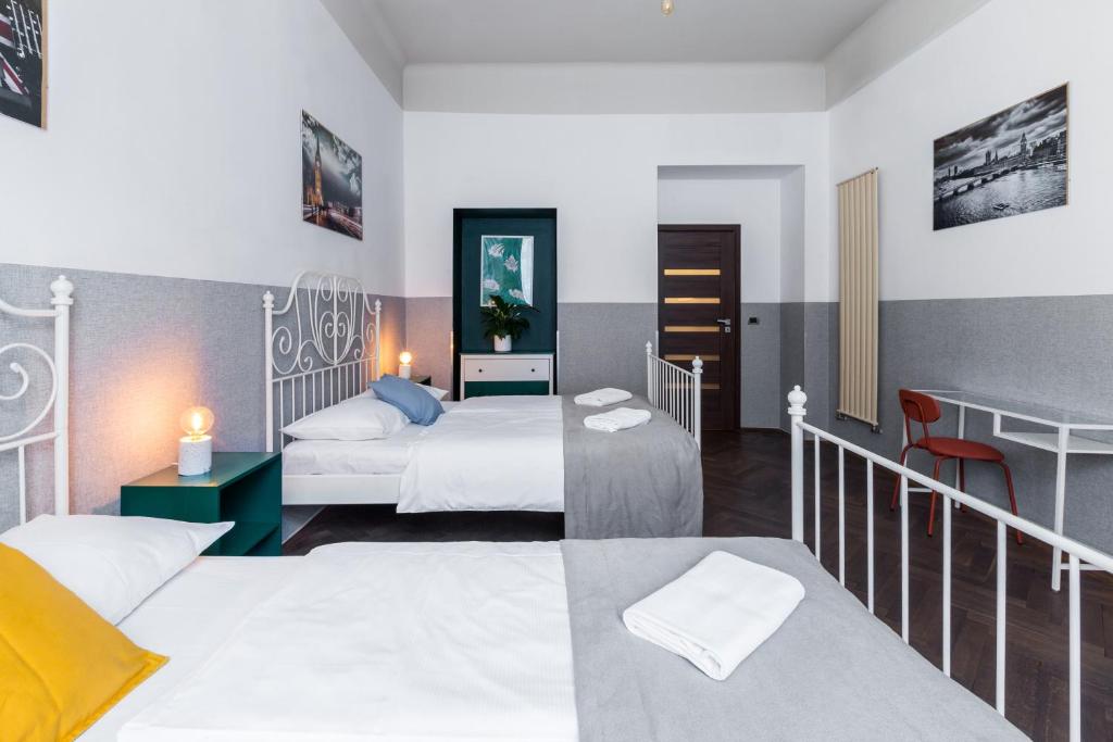 Posteľ alebo postele v izbe v ubytovaní Friendhouse Apartments Starovislna