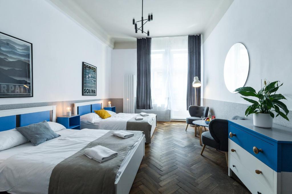 Posteľ alebo postele v izbe v ubytovaní Friendhouse Apartments Starovislna