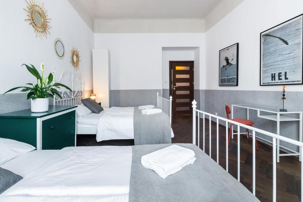 Posteľ alebo postele v izbe v ubytovaní Friendhouse Apartments Starovislna