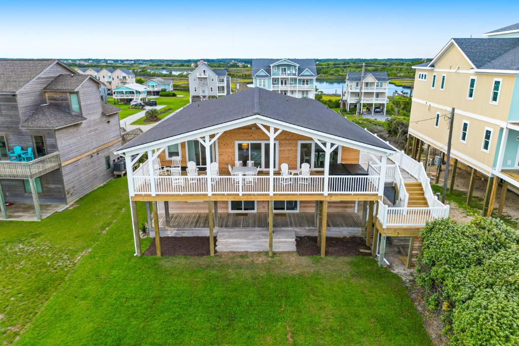 an aerial view of a house with a deck at Beachfront Bliss in North Topsail Beach