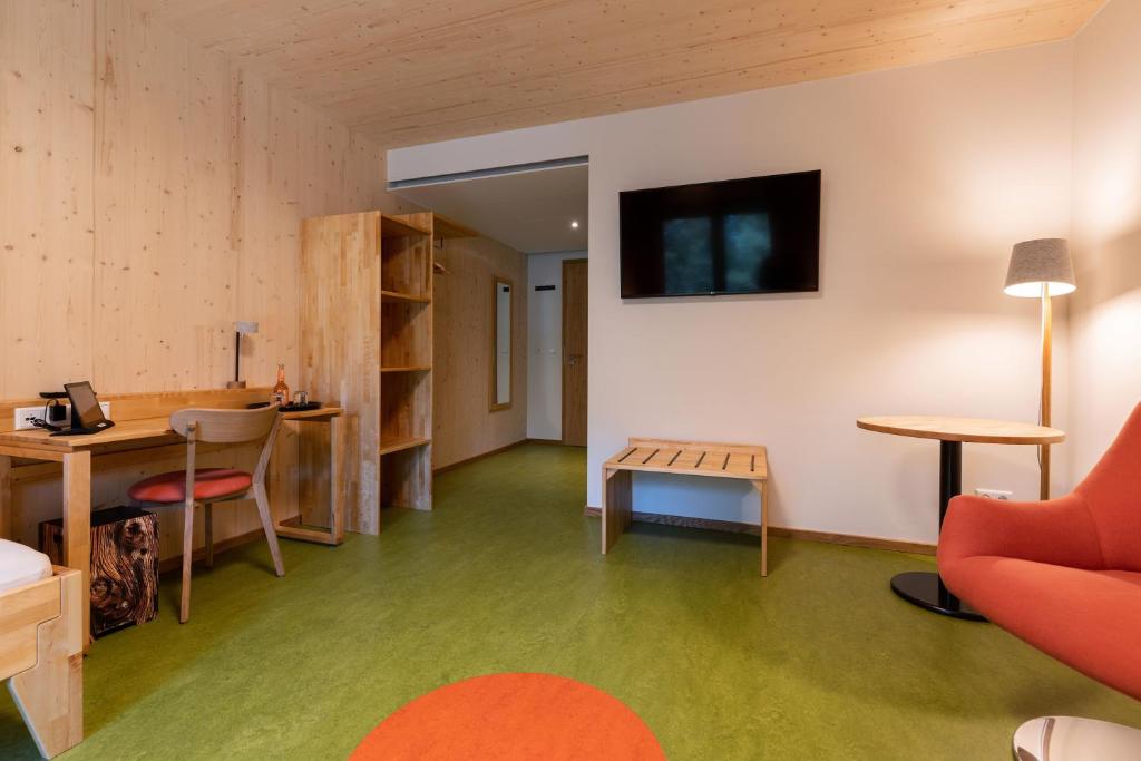 TV a/nebo společenská místnost v ubytování Hotel 11 Eulen