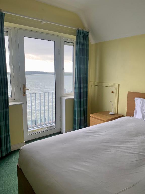 Voodi või voodid majutusasutuse Bella Vista Hotel & Self Catering Suites toas